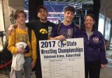 Lemoore's latest state wrestling champion, Gary Joint shares the moment with family (L to R) brother Wayne, his father, Kevin, and mother, Melissa.
